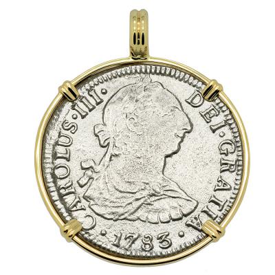 El Cazador treasure coin in gold pendant