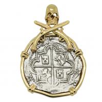 Colonial Spanish Peru, King Philip II two reales 1575-1598 in 14k gold skull and pistols pendant.