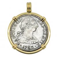 Spanish 2 reales dated 1783 in 14k gold pendant, The 1784 Shipwreck that Changed America.