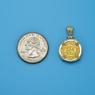 Pendant size next to a Quarter