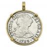 El Cazador treasure coin in gold pendant