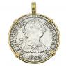 El Cazador treasure coin in gold pendant