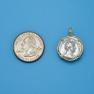 Pendant size next to a Quarter