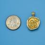 Pendant size next to a Quarter
