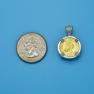 Pendant size next to a Quarter