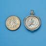 Pendant size next to a Quarter