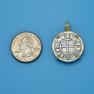 Pendant size next to a Quarter
