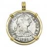El Cazador treasure coin in gold pendant