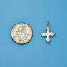 Cross size next to a Quarter