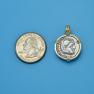 Pendant size next to a Quarter