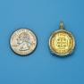 Pendant size next to a Quarter