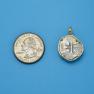 Pendant size next to a Quarter