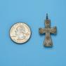 Cross size next to a Quarter