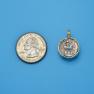Pendant size next to a Quarter