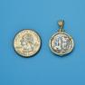 Pendant size next to a Quarter