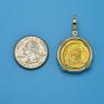 Pendant size next to a Quarter