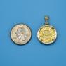 Pendant size next to a Quarter