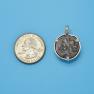 Pendant size next to a Quarter