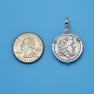 Pendant size next to a Quarter