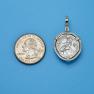 Pendant size next to a Quarter