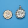 Pendant size next to a Quarter