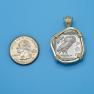 Pendant size next to a Quarter
