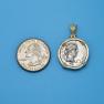 Pendant size next to a Quarter