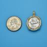Pendant size next to a Quarter
