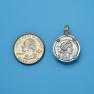 Pendant size next to a Quarter