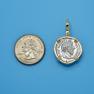 Pendant size next to a Quarter
