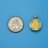 Pendant size next to a Quarter