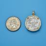 Pendant size next to a Quarter