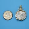 Pendant size next to a Quarter