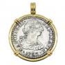 El Cazador treasure coin in gold pendant
