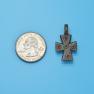 Cross size next to a Quarter