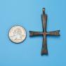 Cross size next to a Quarter