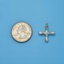 Cross size next to a Quarter