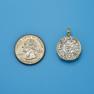 Pendant size next to a Quarter