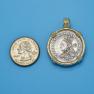 Pendant size next to a Quarter