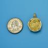 Pendant size next to a Quarter