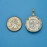 Pendant size next to a Quarter