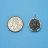 Pendant size next to a Quarter