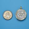 Pendant size next to a Quarter