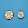 Pendant size next to a Quarter