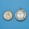 Pendant size next to a Quarter