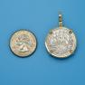 Pendant size next to a Quarter