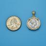 Pendant size next to a Quarter