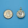 Pendant size next to a Quarter
