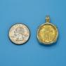 Pendant size next to a Quarter