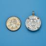 Pendant size next to a Quarter